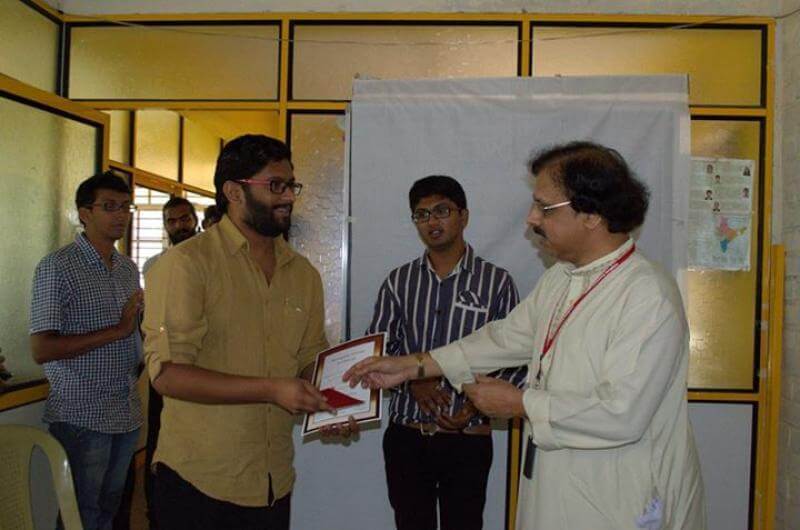 Receiving award from Dr.Mysooru Nagaraja Sharma
