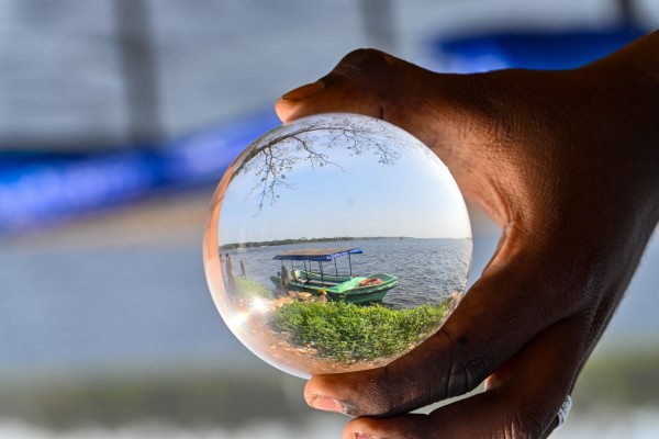 lens ball with boat picture inside it