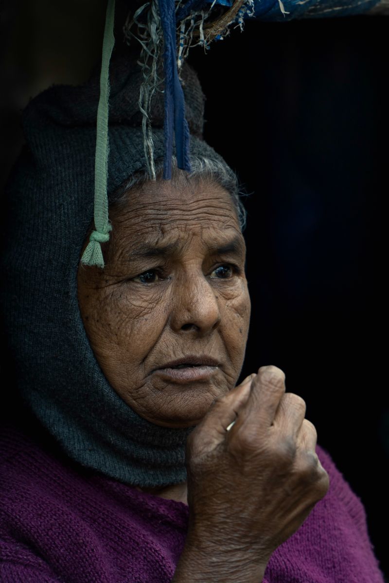 Wrinkled fear on her expression